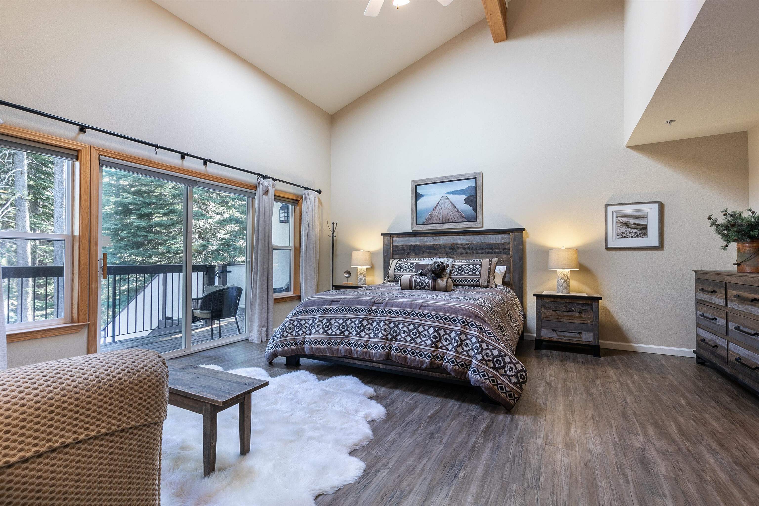227 Olympic Vly Road, Unit 52 Olympic Valley, CA 96146 - Photo 6 of 21 a bedroom with a bed and a large window