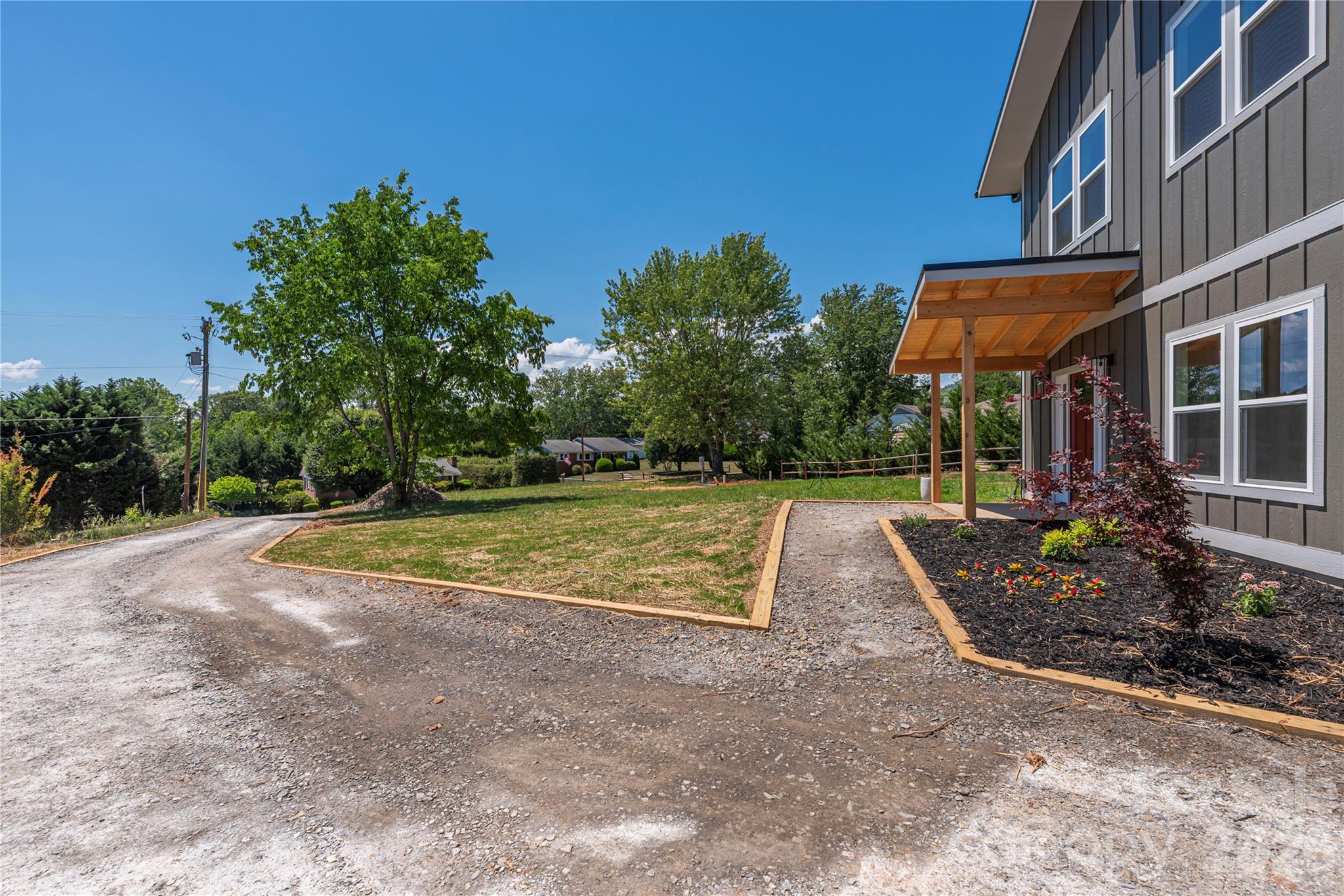 32 Oak Hill Road Candler, NC 28715 - Photo 3 of 29 a view of outdoor space yard and patio