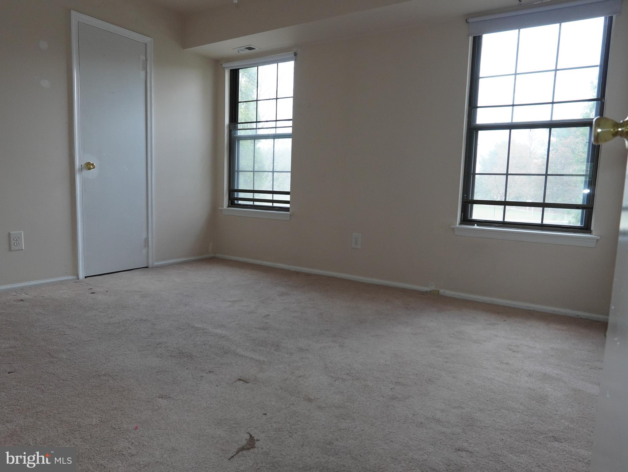 130 B Birchfield Court Mount Laurel, NJ 08054 - Photo 9 of 14 an empty room with windows