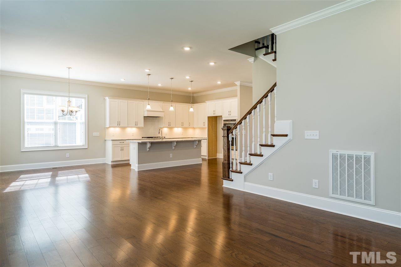 5928 Bellona Lane Raleigh, NC 27612 - Photo 13 of 25 a view of entryway and hall with wooden floor