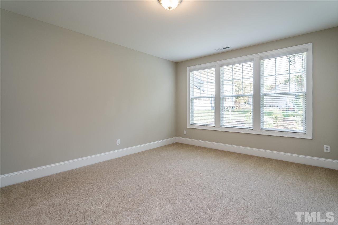 5928 Bellona Lane Raleigh, NC 27612 - Photo 16 of 25 an empty room with a window