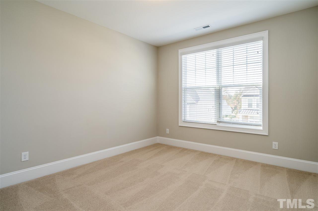 5928 Bellona Lane Raleigh, NC 27612 - Photo 23 of 25 an empty room with a window