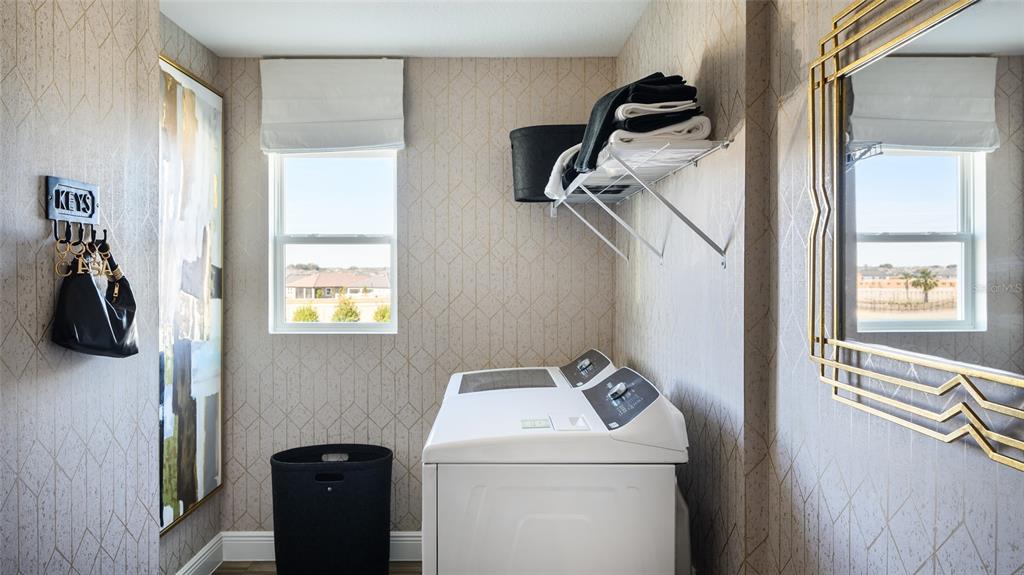 9845 Govreau Road Wesley Chapel, FL 33545 - Photo 20 of 22 a utility room with dryer and washer
