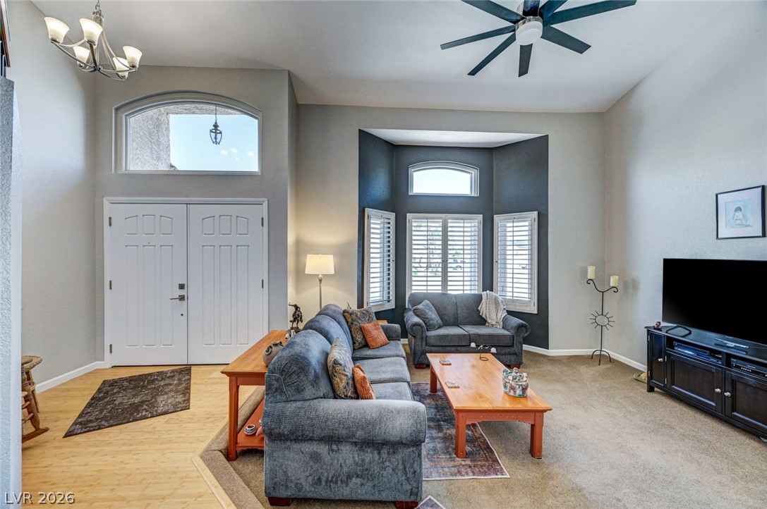 2600 Frontera Road Henderson, NV 89074 - Photo 9 of 47 Double door entry with large transom window adjacent to stepdown living room