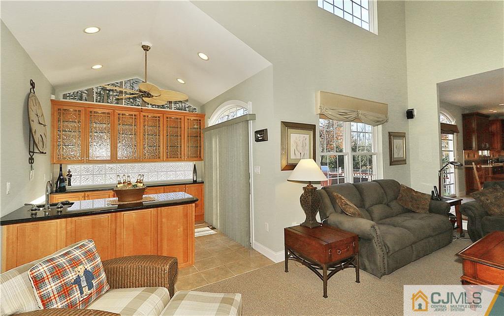 1 Conor Road Jackson, NJ 08527 - Photo 12 of 25 a living room with furniture and a large window