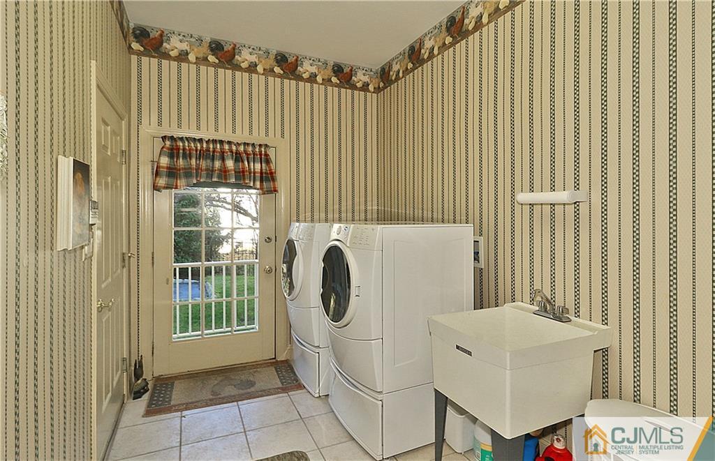 1 Conor Road Jackson, NJ 08527 - Photo 14 of 25 a view of a utility room with washer and dryer