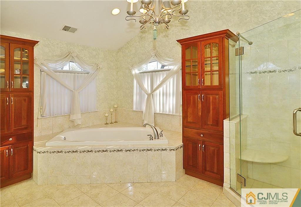 1 Conor Road Jackson, NJ 08527 - Photo 18 of 25 a bathroom with a bathtub and shower