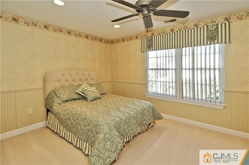 1 Conor Road Jackson, NJ 08527 - Photo 19 of 25 a bedroom with a bed and a window