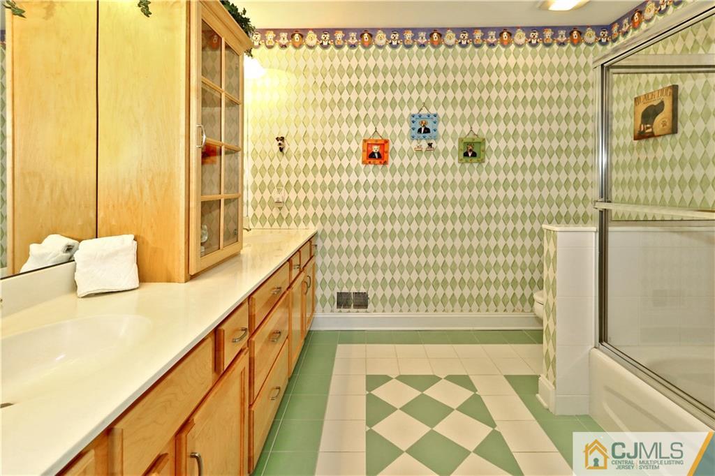 1 Conor Road Jackson, NJ 08527 - Photo 20 of 25 a bathroom with a bathtub and shower