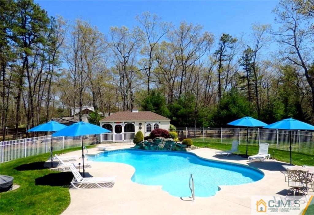 1 Conor Road Jackson, NJ 08527 - Photo 3 of 25 a swimming pool with outdoor seating and yard