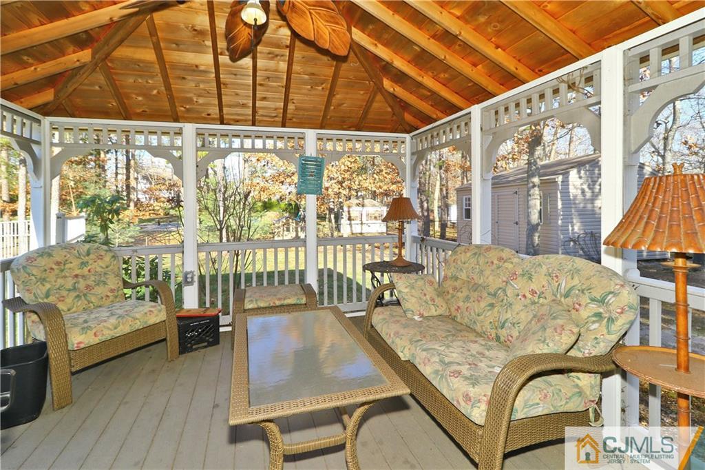 1 Conor Road Jackson, NJ 08527 - Photo 23 of 25 a living room with furniture and a large window