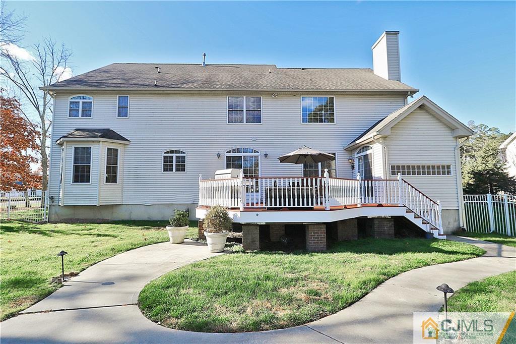 1 Conor Road Jackson, NJ 08527 - Photo 24 of 25 a view of a house with a yard patio and a garden