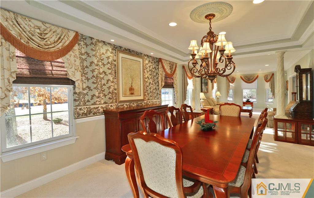 1 Conor Road Jackson, NJ 08527 - Photo 7 of 25 a view of a dining room with furniture and chandelier
