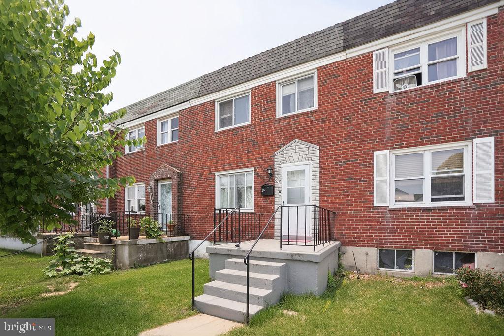 1918 Church Road Baltimore, MD 21222 - Photo 1 of 29 a view of a brick building with a yard
