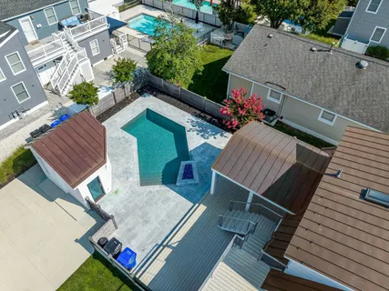 a kitchen with stainless steel appliances a sink stove and cabinets