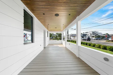 a view of outdoor sitting area with furniture