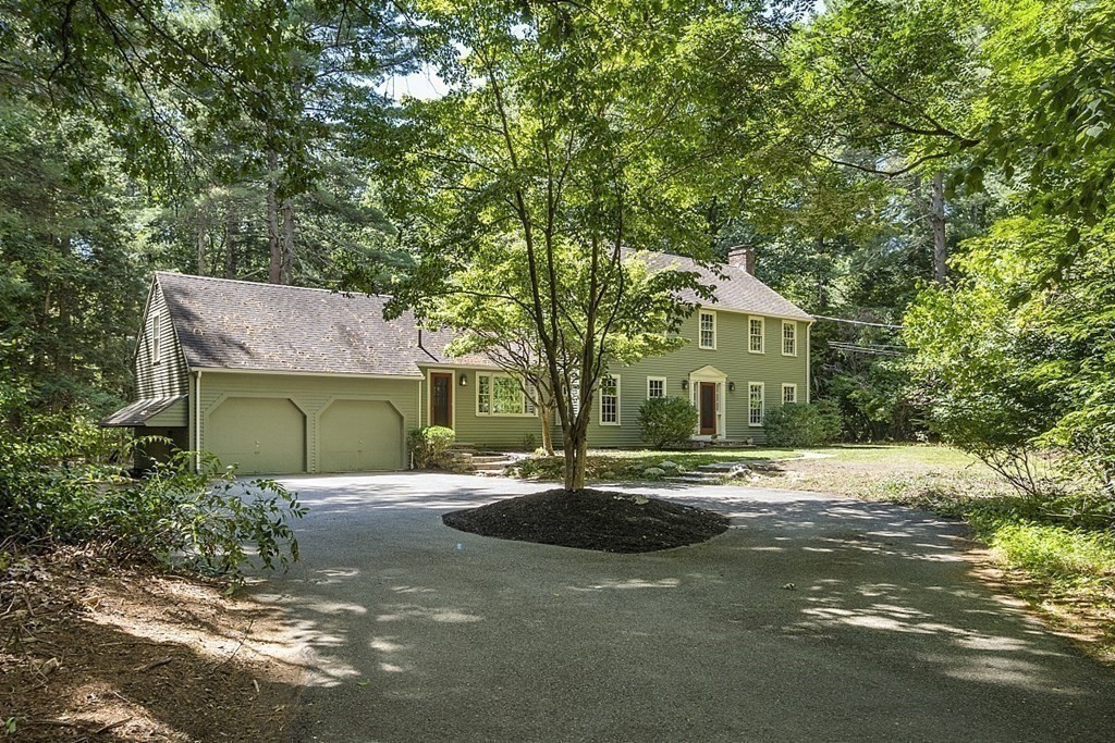 35 Drum Hill Road Concord, MA 01742 - Photo 35 of 35 a front view of a house with garden