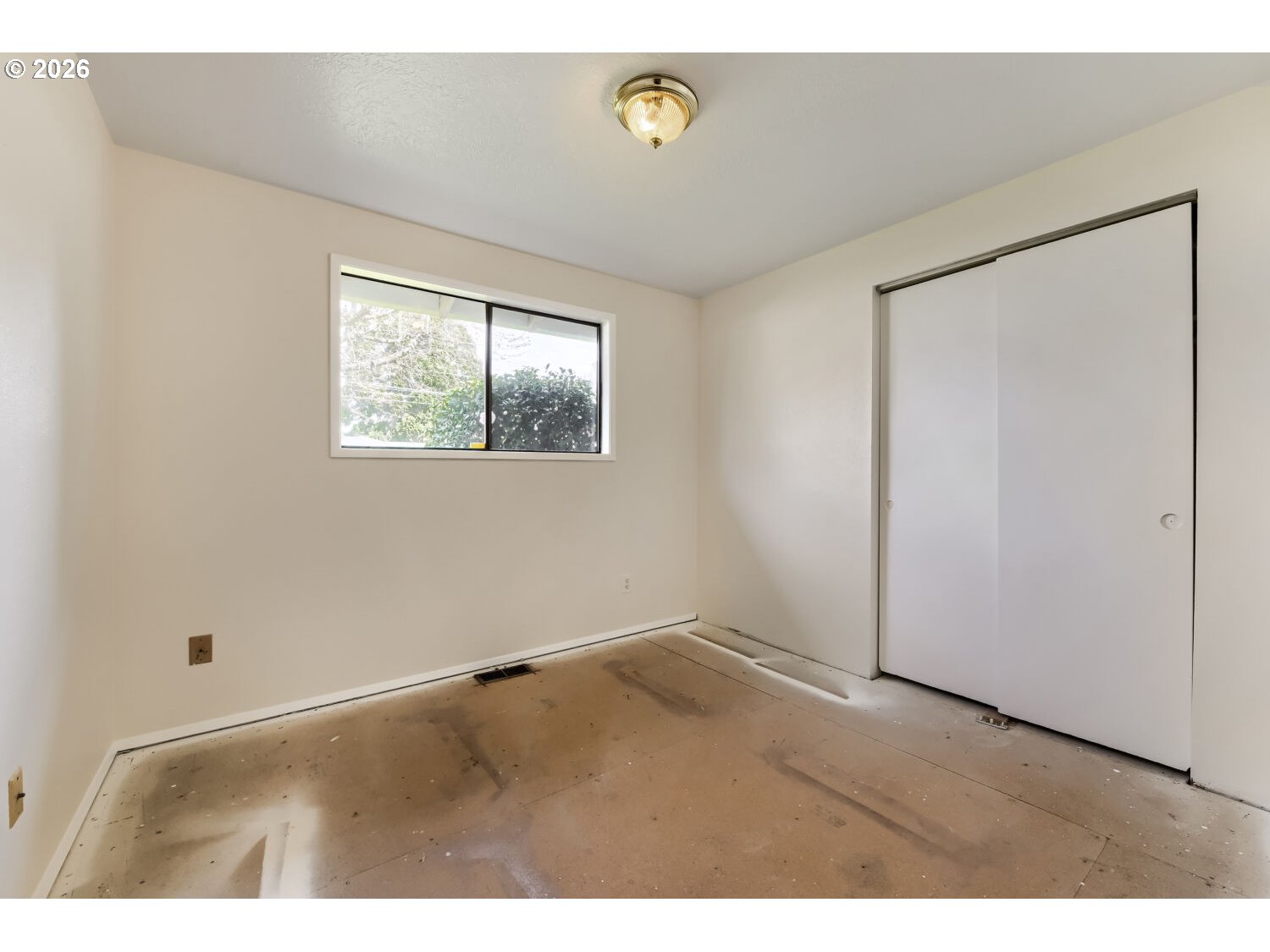 19710 Southwest Johnson Street Beaverton, OR 97003 - Photo 11 of 15 a view of an empty room with a window