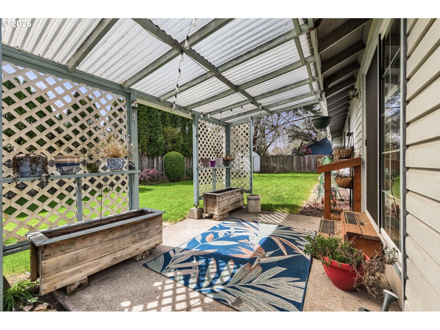 19710 Southwest Johnson Street Beaverton, OR 97003 - Photo 13 of 15 a view of yard with patio