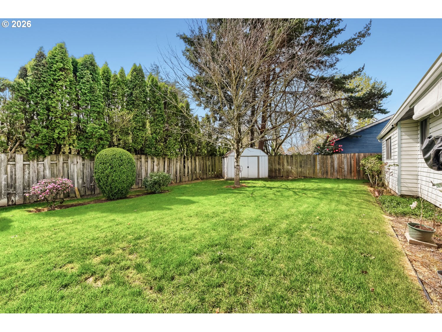 19710 Southwest Johnson Street Beaverton, OR 97003 - Photo 14 of 15 a house view with a garden space