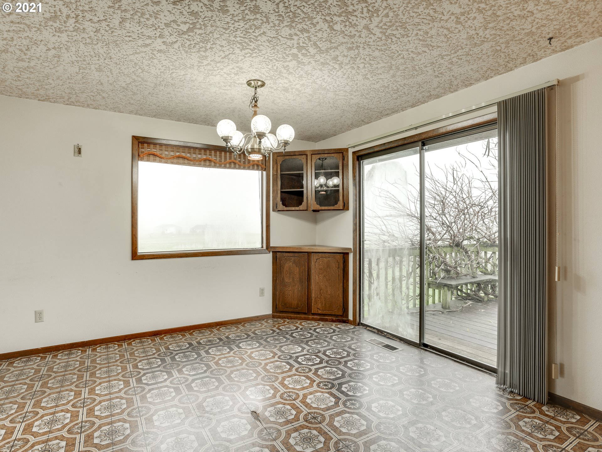 3422 South 31st Way Ridgefield, WA 98642 - Photo 10 of 32 wooden floor in an empty room with a window