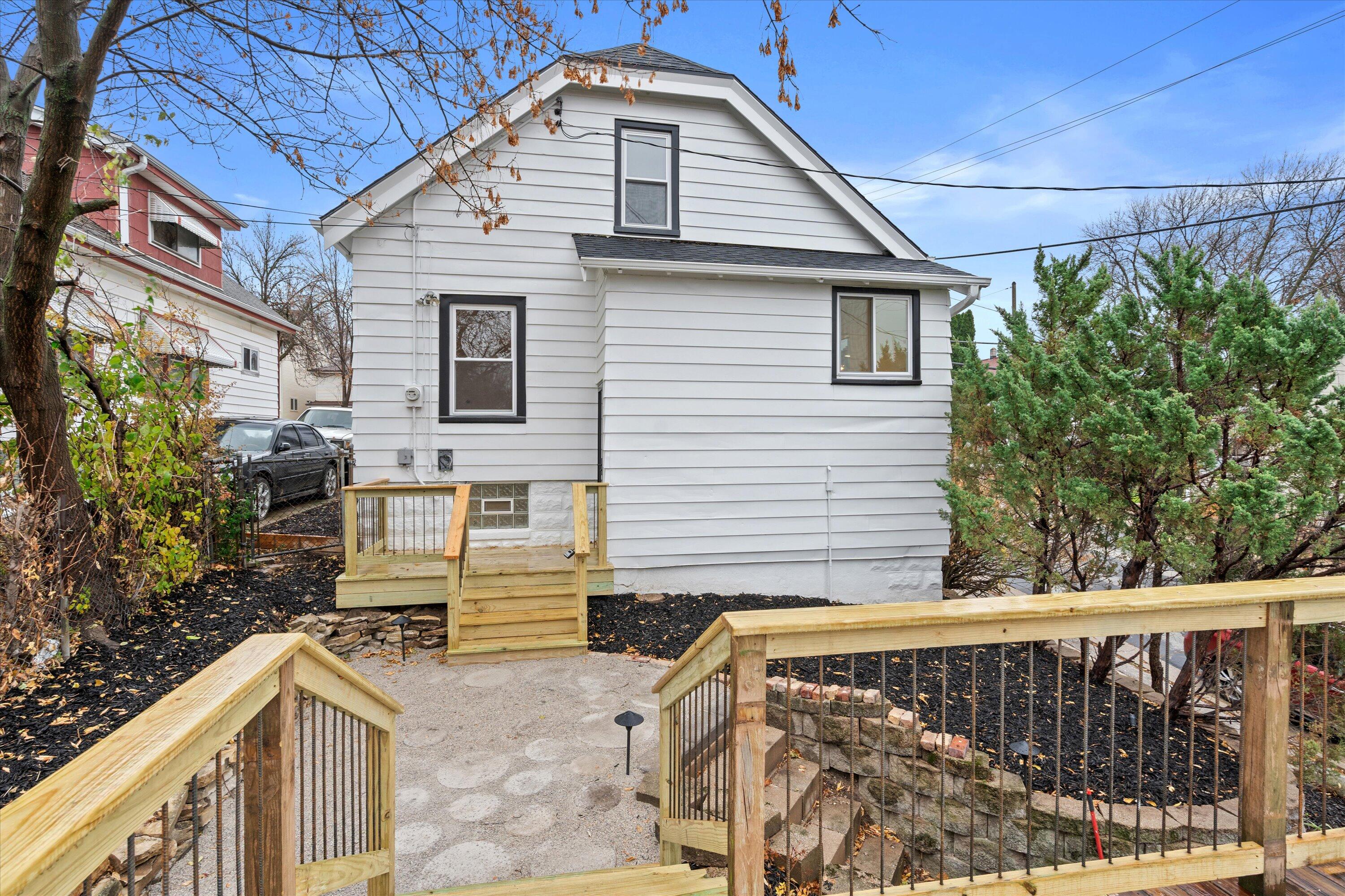 2597 South Austin Street Milwaukee, WI 53207 - Photo 42 of 51 Add a little grass for your furry friends or leave it easy with mulch!