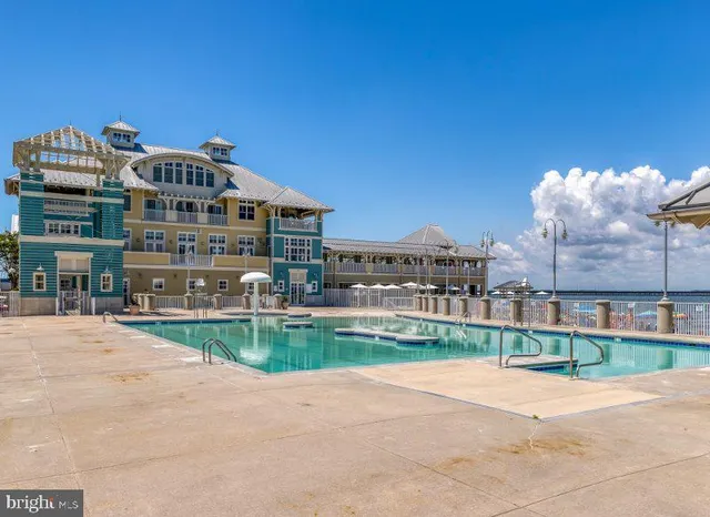 a view of a building with a yard