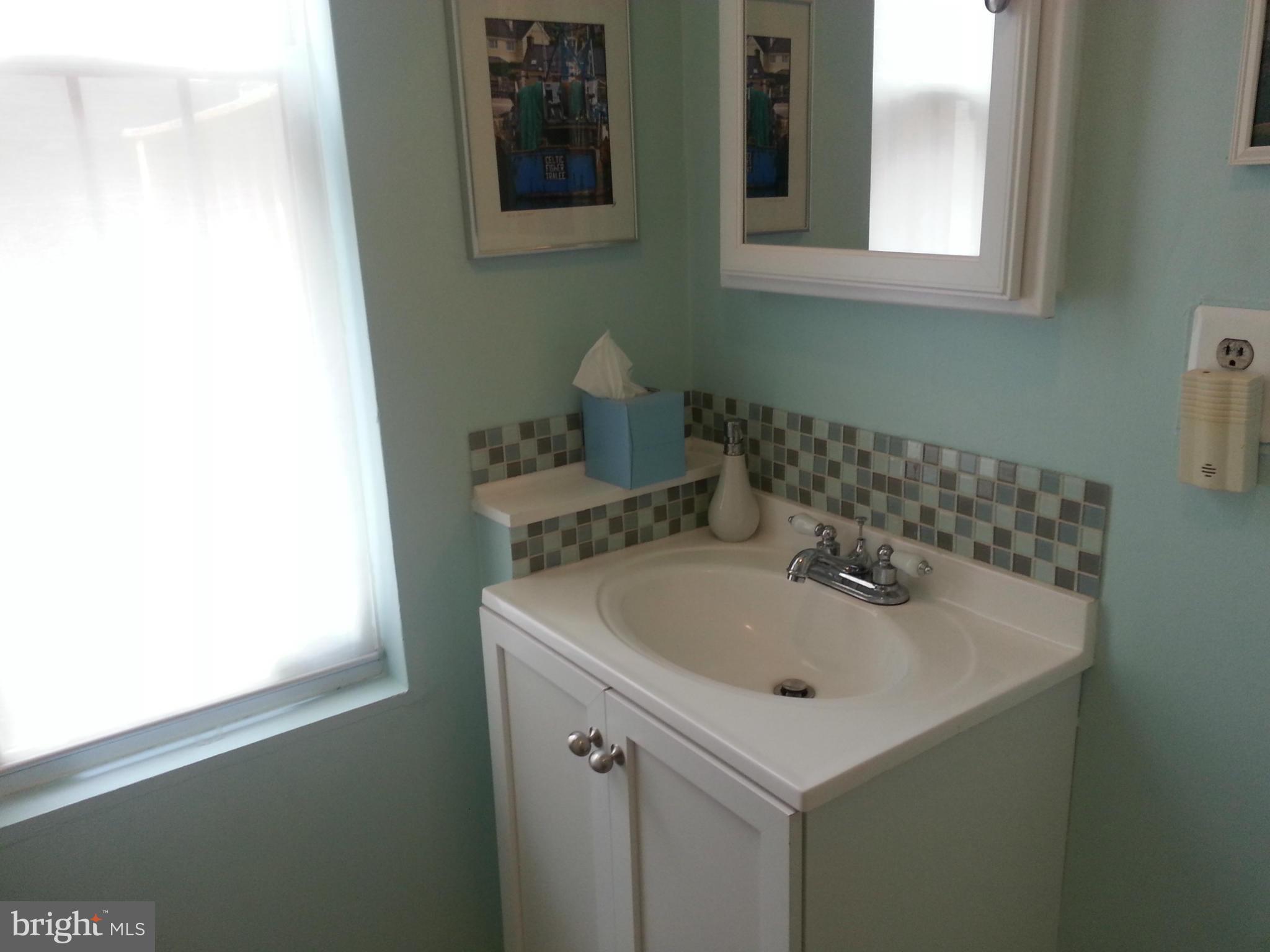 706 7th Street Northeast Washington, DC 20002 - Photo 6 of 21 Main Level Powder Room