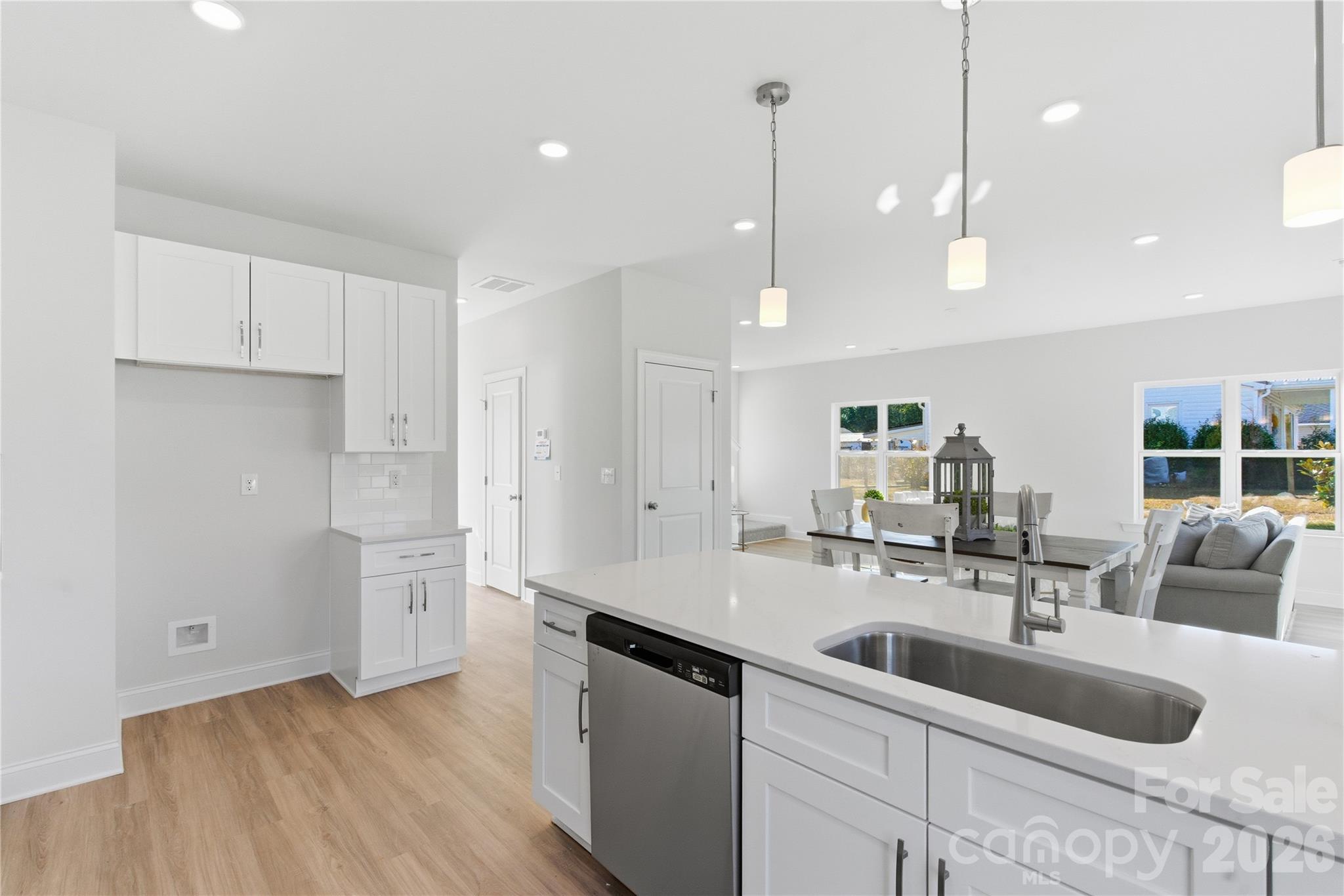 230 1st Street South Fort Mill, SC 29708 - Photo 11 of 22 a kitchen with a sink appliances and cabinets