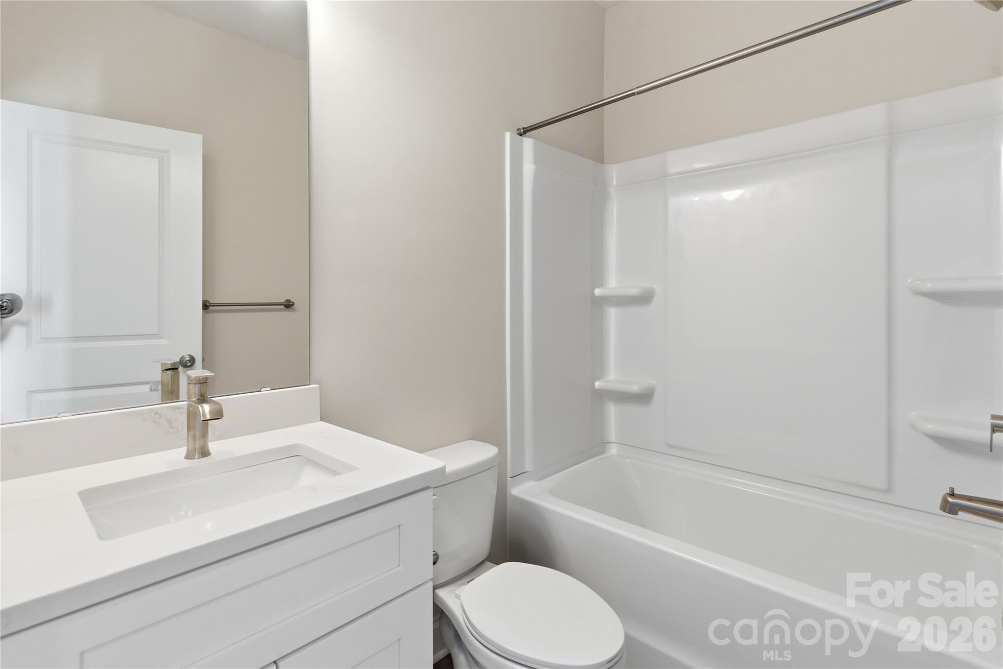 230 1st Street South Fort Mill, SC 29708 - Photo 14 of 22 a bathroom with a sink toilet and bathtub