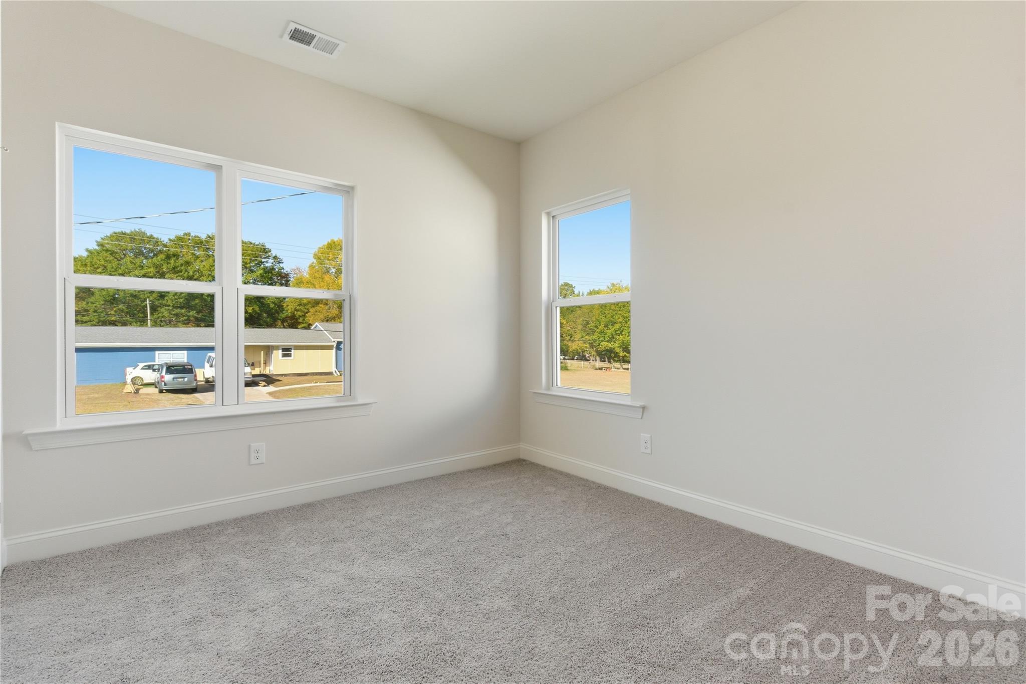 230 1st Street South Fort Mill, SC 29708 - Photo 19 of 22 an empty room with windows