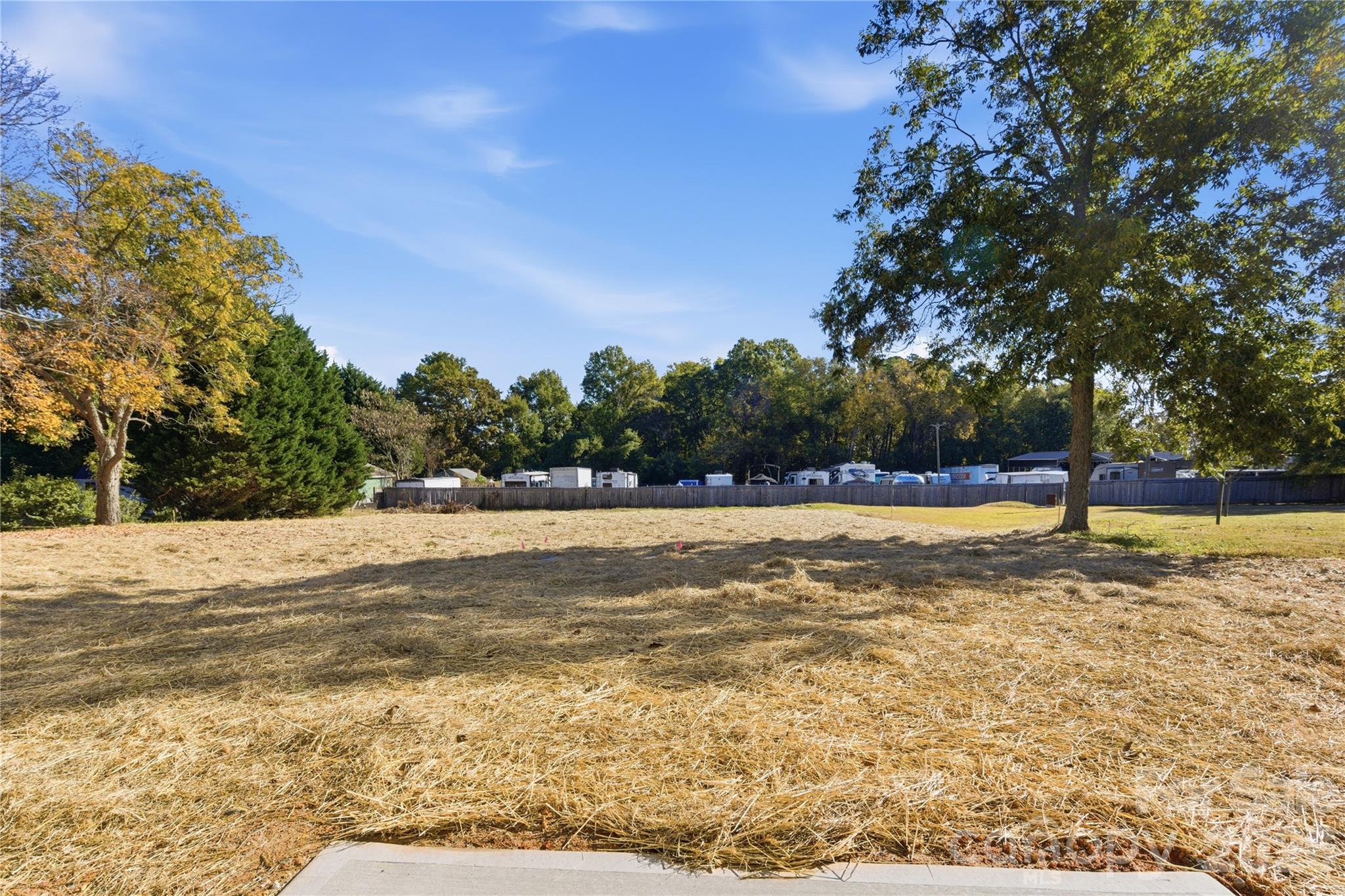 230 1st Street South Fort Mill, SC 29708 - Photo 22 of 22 a view of a swimming pool with an outdoor space and seating area