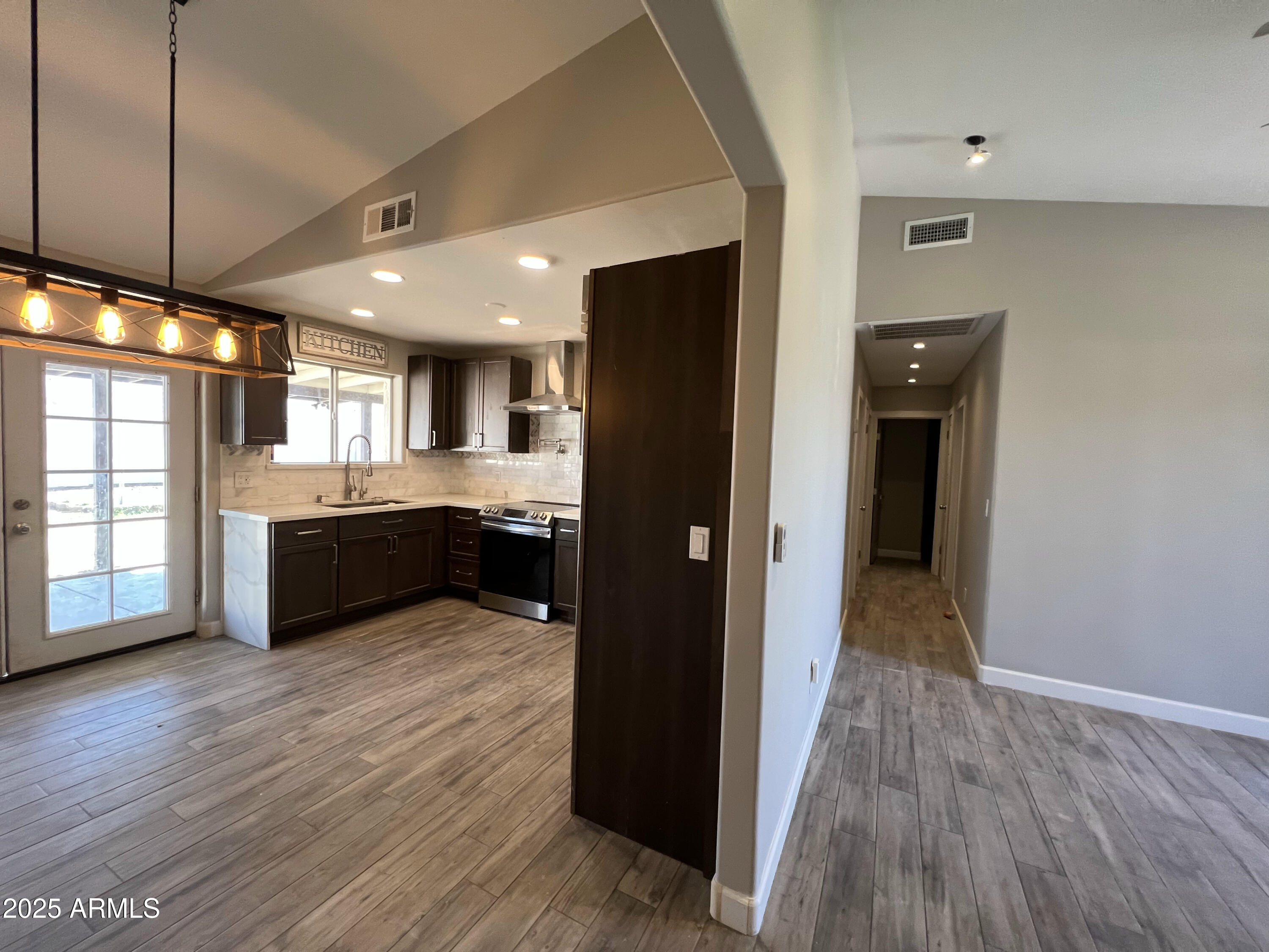 8201 South 26th Street Phoenix, AZ 85042 - Photo 26 of 42 a view of kitchen with sink and refrigerator