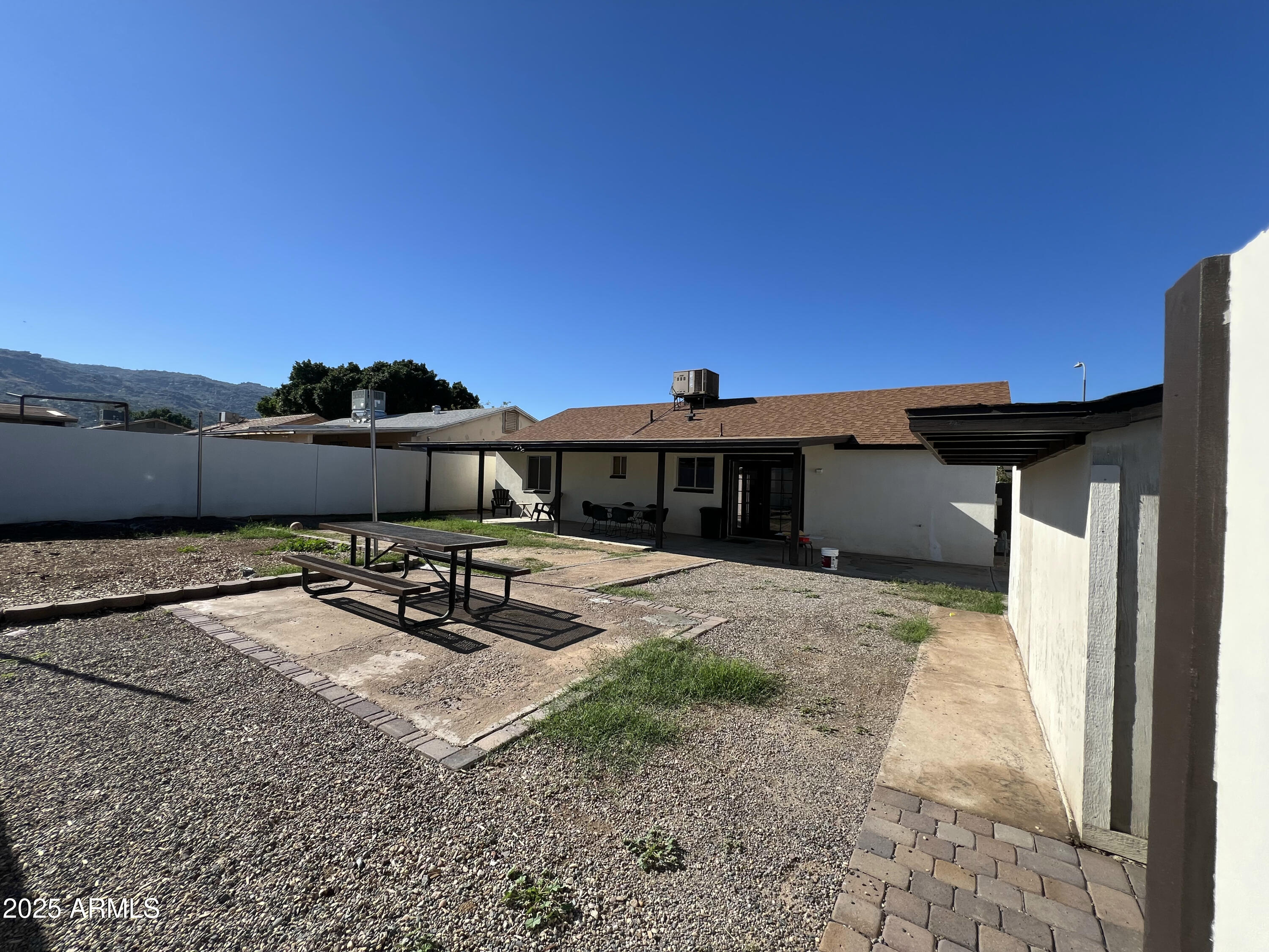8201 South 26th Street Phoenix, AZ 85042 - Photo 32 of 42 a view of a terrace with a bench