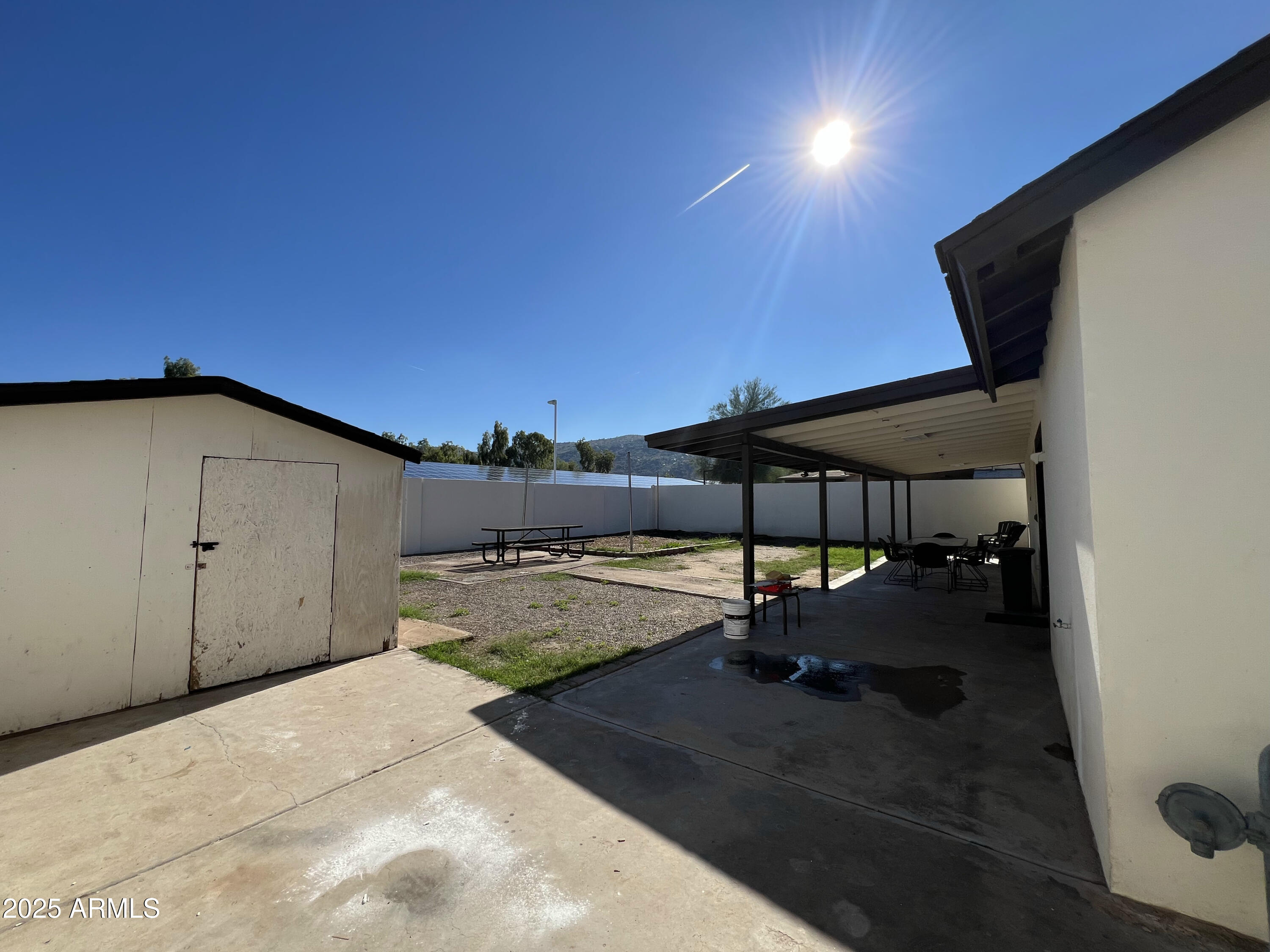 8201 South 26th Street Phoenix, AZ 85042 - Photo 35 of 42 a view of a backyard space with porch