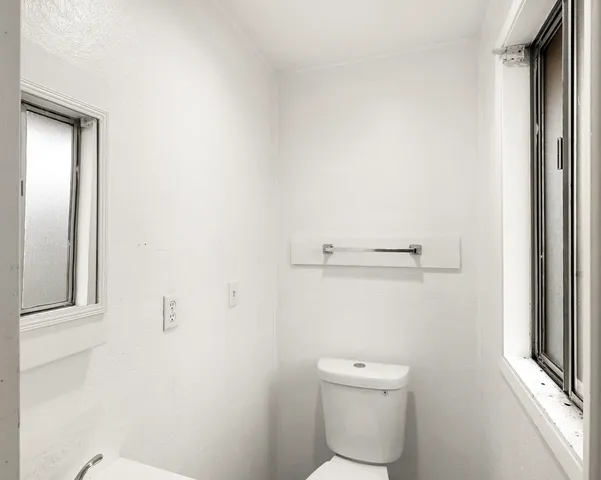 a bathroom with a toilet