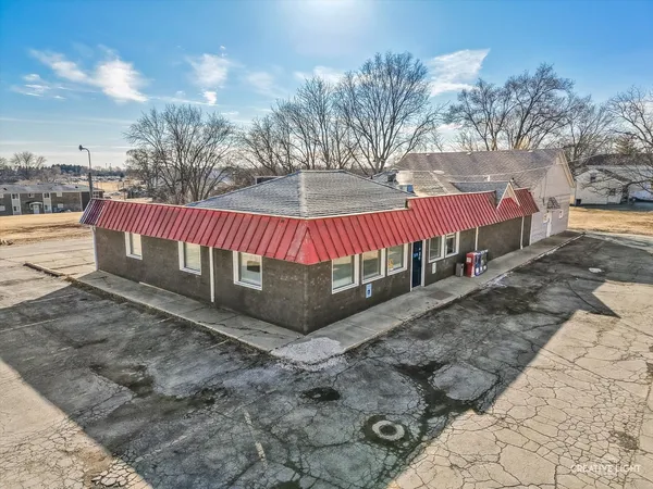 a view of a park with large trees