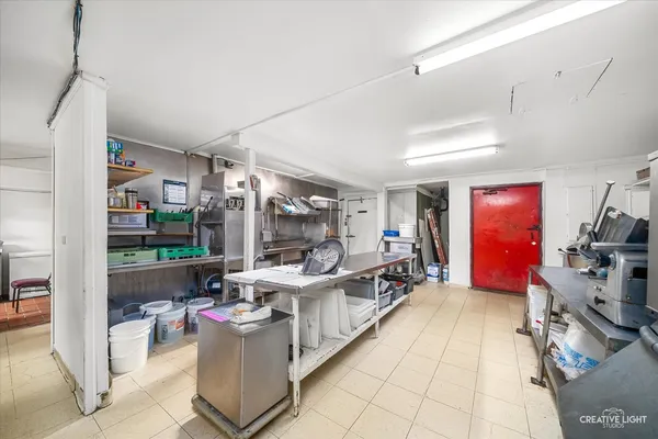 a view of a workspace with furniture and toys