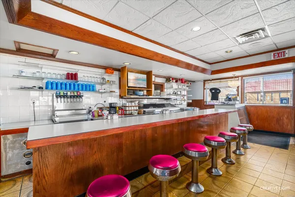 a very nice looking room with a gym equipment