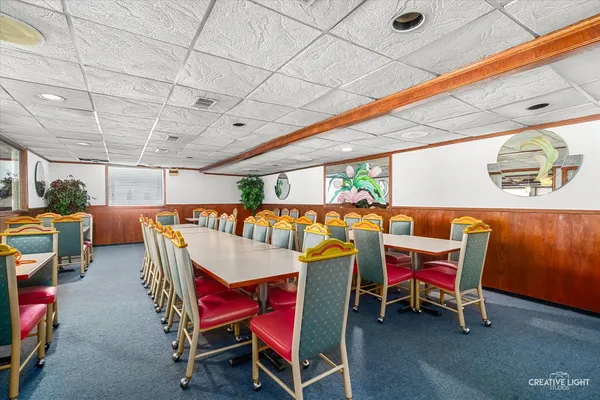 a large kitchen with a stove and a sink