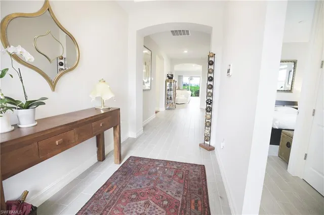 a view of a living room and bathroom