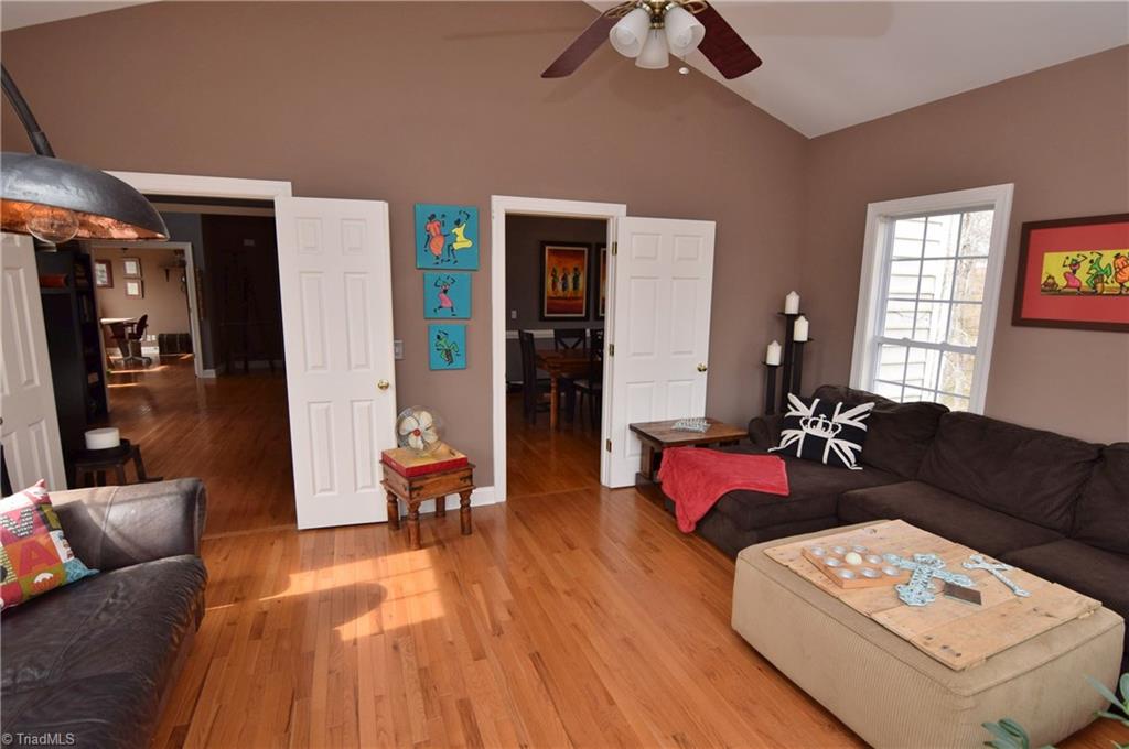 704 Number Ten Way Oak Ridge, NC 27310 - Photo 13 of 30 Vaulted ceilings - open to living and dining rooms.