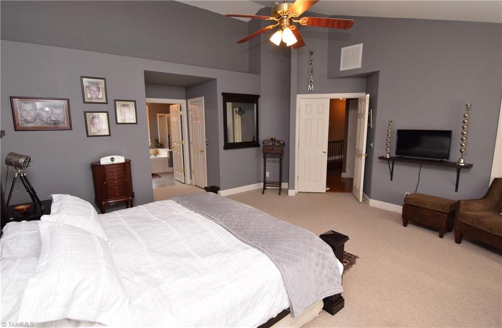 704 Number Ten Way Oak Ridge, NC 27310 - Photo 15 of 30 Master suite