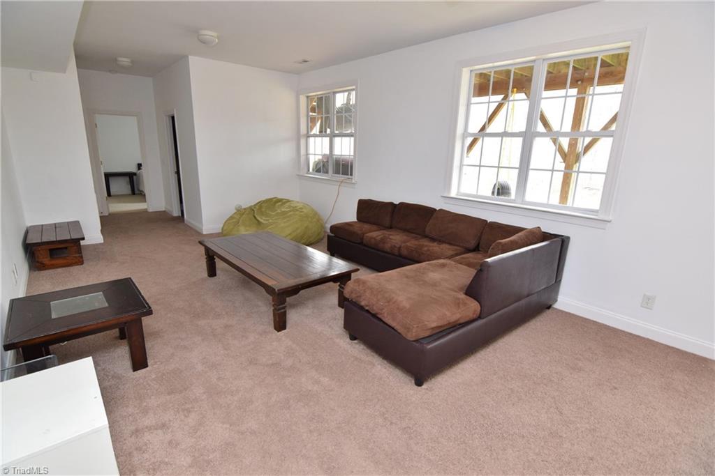 704 Number Ten Way Oak Ridge, NC 27310 - Photo 23 of 30 Lower level rec room or second den space!
