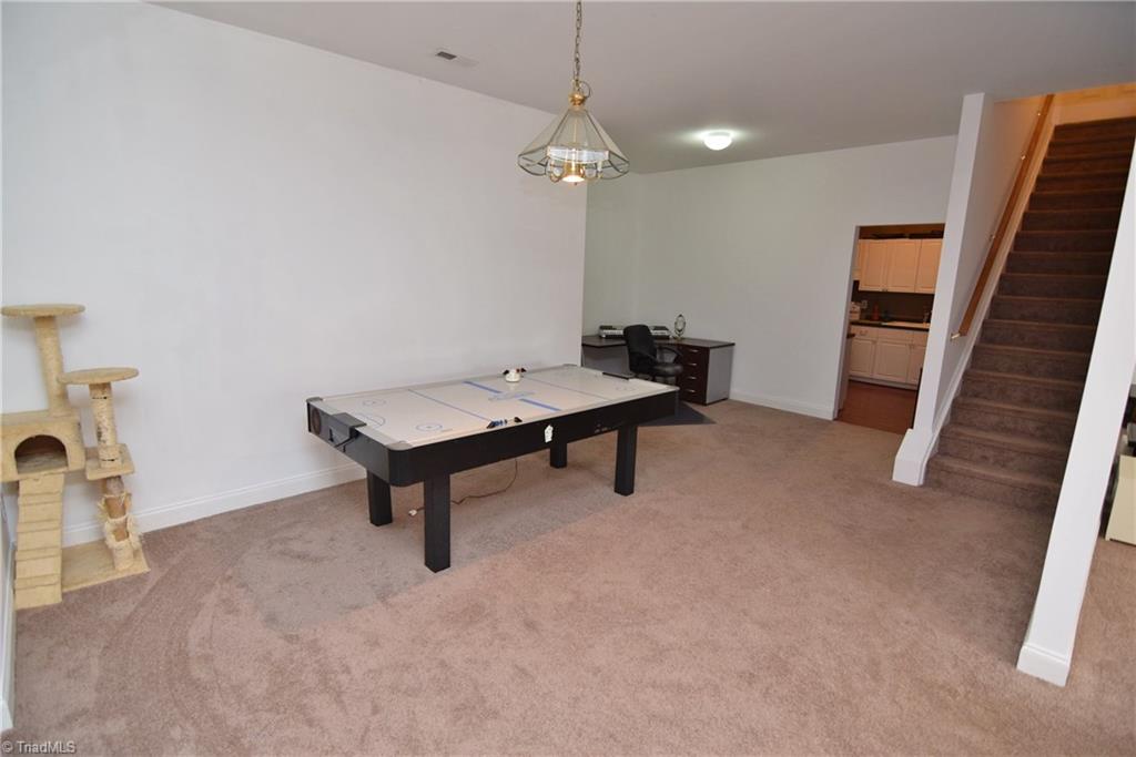 704 Number Ten Way Oak Ridge, NC 27310 - Photo 24 of 30 The lower level could be an in-law suite or a teen suite.
