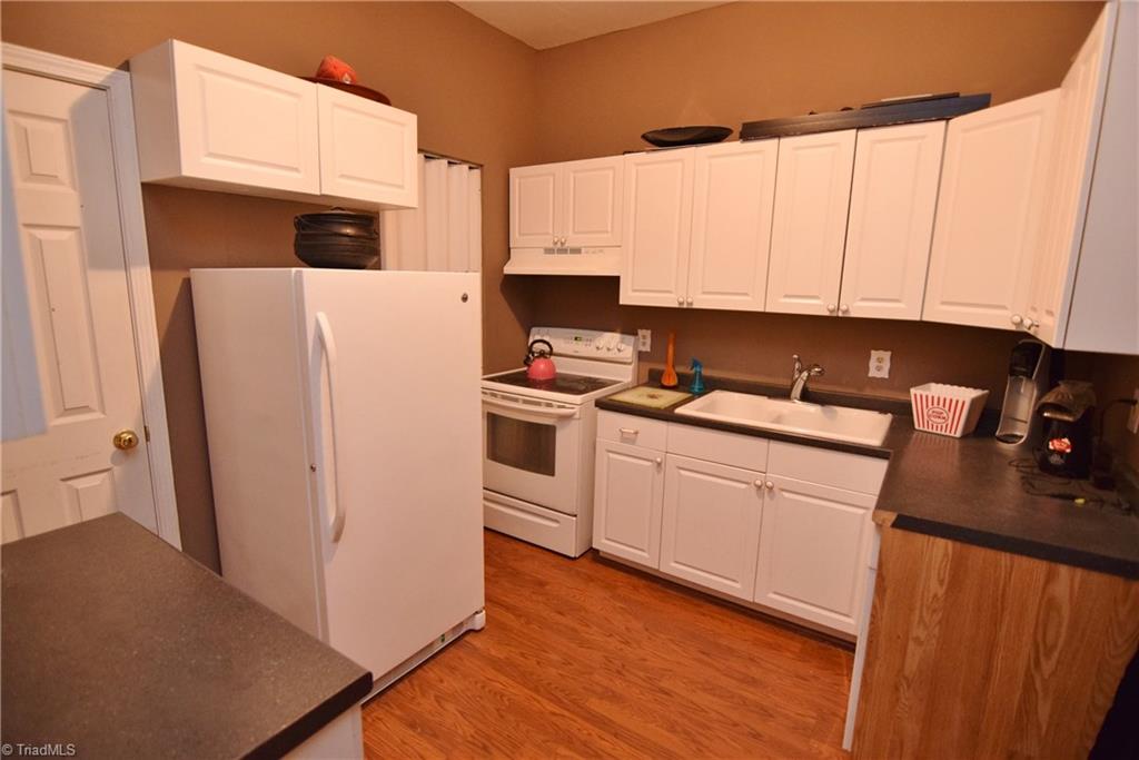 704 Number Ten Way Oak Ridge, NC 27310 - Photo 25 of 30 The lower level full kitchen!