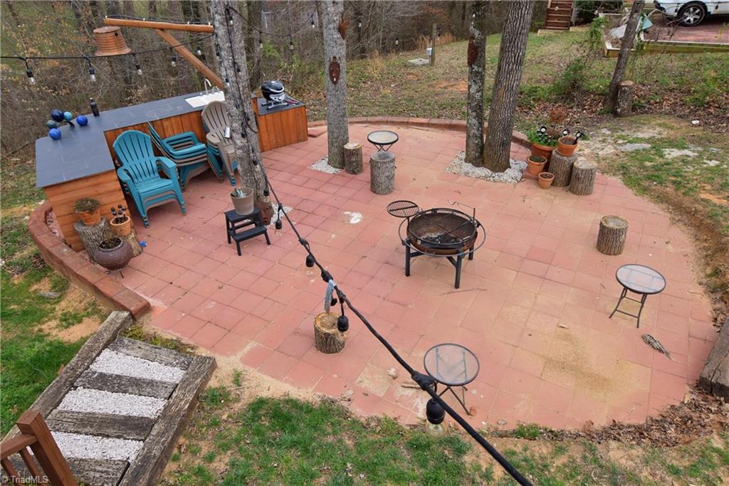 704 Number Ten Way Oak Ridge, NC 27310 - Photo 28 of 30 A great patio is plumbed with water. A wonderful place to entertain and enjoy!