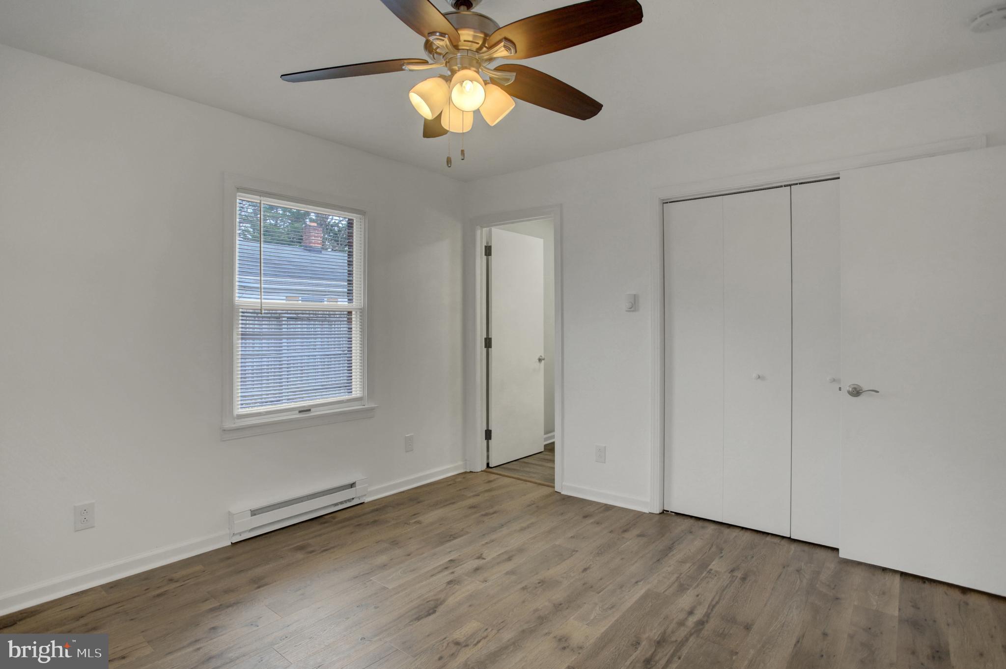 16944 Shinham Road Hagerstown, MD 21740 - Photo 12 of 29 a view of an empty room with a window