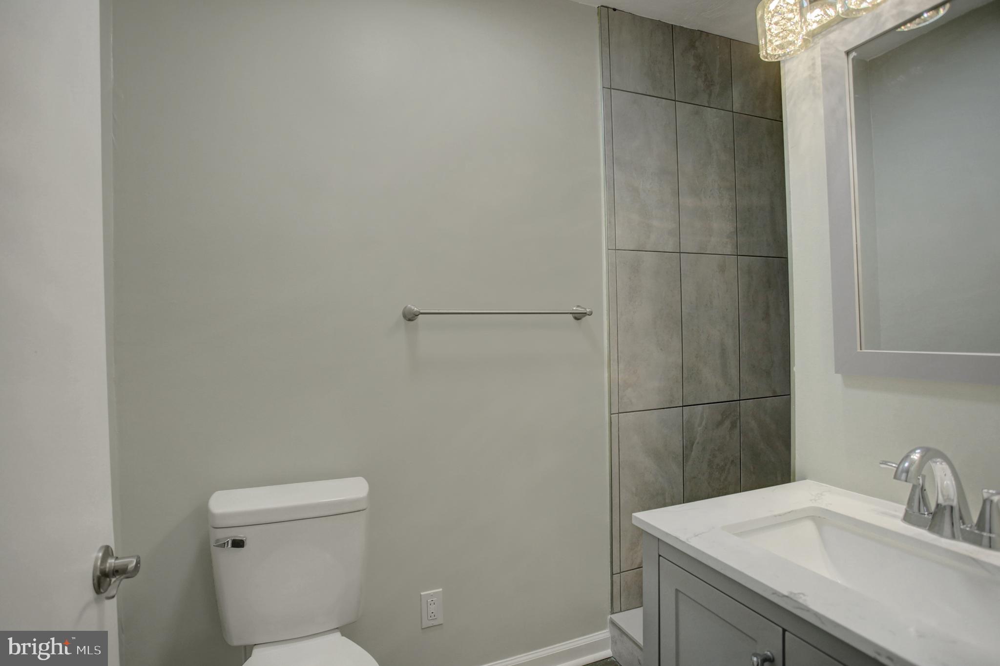 16944 Shinham Road Hagerstown, MD 21740 - Photo 13 of 29 a bathroom with a sink and toilet