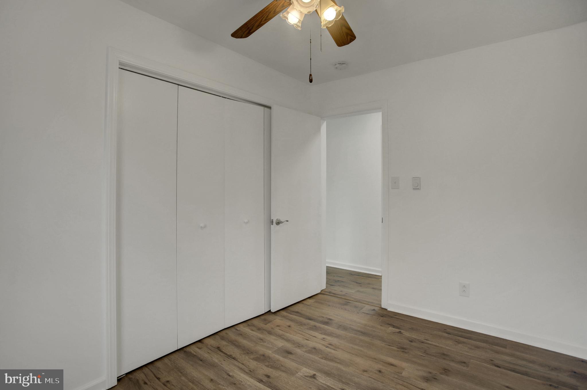16944 Shinham Road Hagerstown, MD 21740 - Photo 20 of 29 a view of an empty room with wooden floor